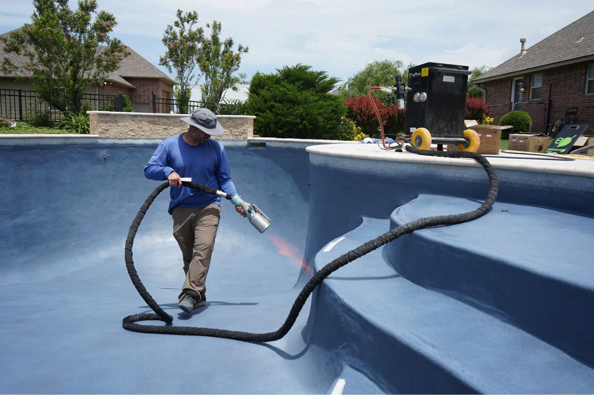 SC Pool Resurfacing applying durable pool coating